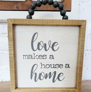 New Love Makes a House a Home sign